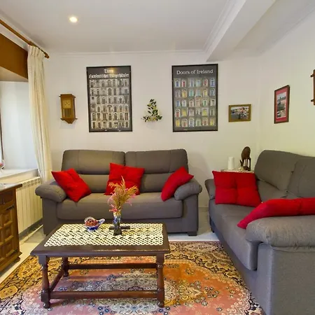 El Amanecer Comillas