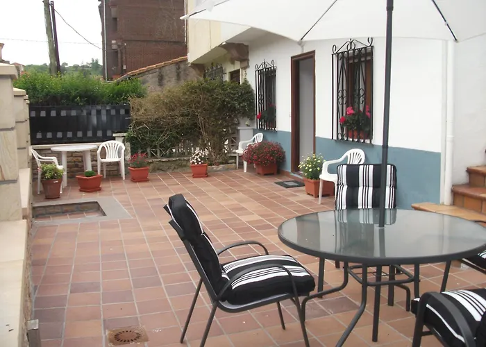 El Amanecer Comillas