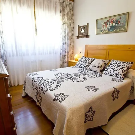 El Amanecer Comillas